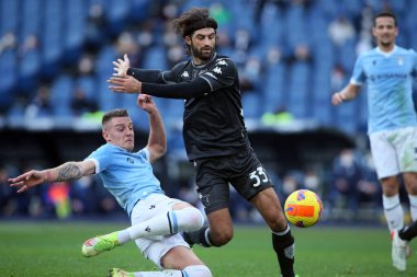ROME, Italy - 06.01.2022: MILINKOVIC SAVIC (LAZIO), S.LUPERTO (EMP) in action during the Italian Serie A football match between SS LAZIO VS EMPOLI at Olympic stadium in Rome
