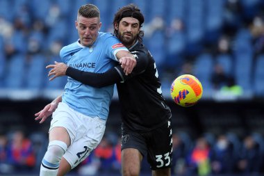 ROME, Italy - 06.01.2022: MILINKOVIC SAVIC (LAZIO), S.LUPERTO (EMP) in action during the Italian Serie A football match between SS LAZIO VS EMPOLI at Olympic stadium in Rome