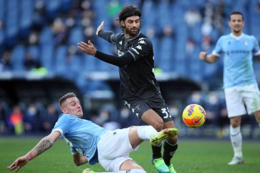 ROME, Italy - 06.01.2022: MILINKOVIC SAVIC (LAZIO), S.LUPERTO (EMP) in action during the Italian Serie A football match between SS LAZIO VS EMPOLI at Olympic stadium in Rome