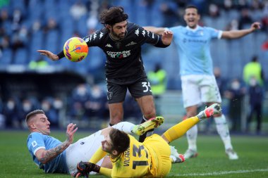 ROME, Italy - 06.01.2022: G.VICARIO (EMP), MILINKOVIC SAVIC (LAZIO), S.LUPERTO (EMP) in action during the Italian Serie A football match between SS LAZIO VS EMPOLI at Olympic stadium in Rome