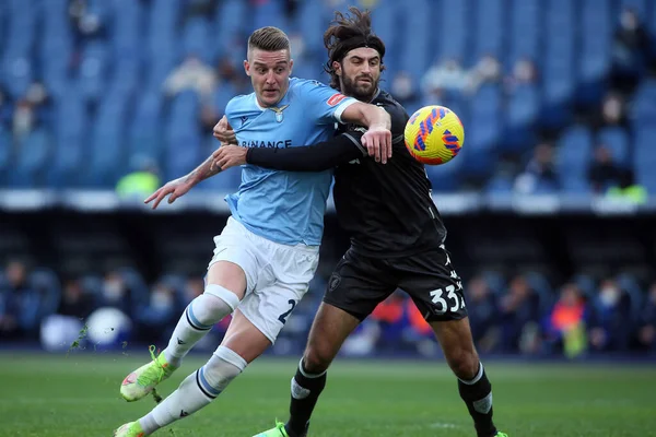 ROME, Italy - 06.01.2022: MILINKOVIC SAVIC (LAZIO), S.LUPERTO (EMP) in action during the Italian Serie A football match between SS LAZIO VS EMPOLI at Olympic stadium in Rome