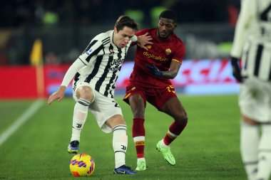 ROME, Italy - 09.01.2022: F. CHIESA (JU), NILES (ROMA) in action during the Italian Serie A football match between SS AS ROMA VS SS FC JUVENTUS at Olympic stadium in Rome