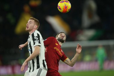 ROME, Italy - 09.01.2022: D. KULUSEVSKI (JU), BRYAN CRISTANTE (AS ROMA) in action during the Italian Serie A football match between SS AS ROMA VS SS FC JUVENTUS at Olympic stadium in Rome