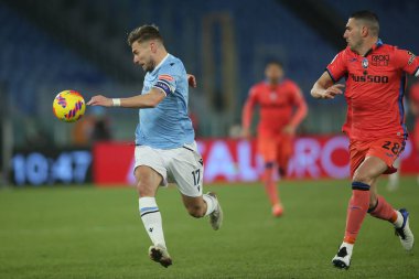 ROME, İtalya - 22.01.2022: CIRO IMMOBILE (LAZIO), MERITH DEMIRAL (ATA) İtalyan Serisi sırasında eylem halindeydi.