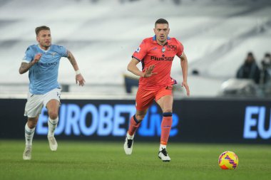 ROME, İtalya - 22.01.2022: MERITH DEMIRAL (ATA), CIRO IMMOBILE (LAZIO) İtalyan Serisi sırasında eylem halindeydi.