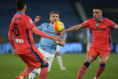 ROME, İtalya - 22.01.2022: CIRO IMMOBILE (LAZIO), MERITH DEMIRAL (ATA) İtalyan Serisi sırasında eylem halindeydi.