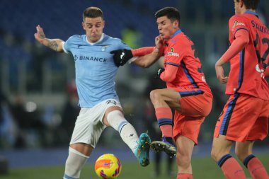 ROME, İtalya - 22.01.2022: MILINKOVIC SAVIC (LAZIO), PESSINA (ATA) İtalyan Serisi sırasında SS LAZIO - ATALANTA arasında Roma Olimpiyat Stadyumu 'nda oynanan maç