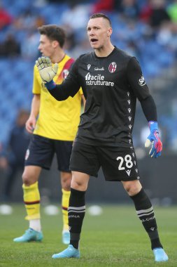 ROME, İtalya - 12.02.2022: SKORUPSKI (BOL) İtalyan Serisi A futbol karşılaşmasında SS LAZIO ile BOLOGNA arasında Roma Olimpiyat Stadyumu 'nda oynanan karşılaşma