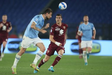 ROME, İtalya - 16.04.2022: F.ACERBI (LAZIO), PELLEGRI (TO) İtalyan Serisi 'nde SS LAZIO-TORINO FC maçı sırasında Roma Olimpiyat Stadyumu' nda