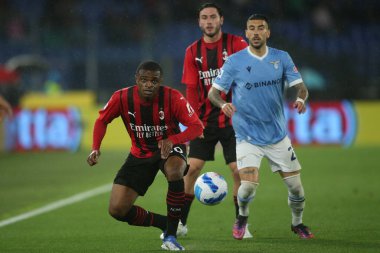 ROME, Italy - 24.04.2022: KALULU (MIL), ZACCAGNI (LAZIO)  in action during the Italian Serie A football match between SS LAZIO VS AC MILAN at Olympic stadium in Rome