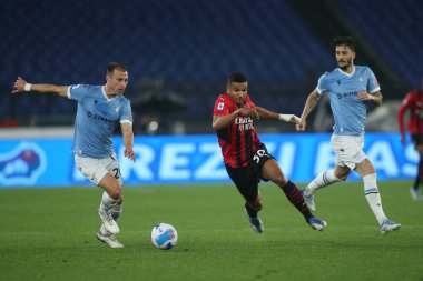 ROME, İtalya - 24.04.2022: S.RADU (LAZIO), MESSIAS (MIL) İtalyan Serisi A futbol karşılaşması sırasında SS LAZIO - AC MILAN