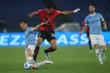ROME, İtalya - 24.04.2022: S.RADU (LAZIO), MESSIAS (MIL) İtalyan Serisi A futbol karşılaşması sırasında SS LAZIO - AC MILAN