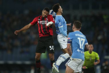 ROME, İtalya - 24.04.2022: MESSIAS (MIL), FELIPE ANDERSON (LAZIO) İtalyan Serisi sırasında SS LAZIO - AC MILAN arasında Roma Olimpiyat Stadyumu 'nda oynanan futbol maçı