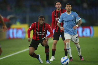ROME, Italy - 24.04.2022:  KALULU (MIL), ZACCAGNI (LAZIO) in action during the Italian Serie A football match between SS LAZIO VS AC MILAN at Olympic stadium in Rome