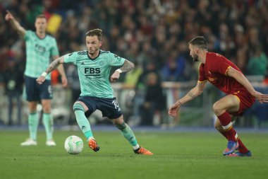 ROME, ITALY - 05.05.2022:  James Maddison (Leicester), BRYAN CRISTANTE (AS ROMA) in action during the UEFA Europa Conference League semi-final match Roma v Leicester City at the Olympic Stadium in Rome.