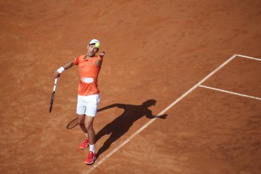 ROME, ITALY - 10.05.2022: NOLAN DJOKOVIC  (SRB)  play game against A.KARATSEV (RUS) during their single men round match in the Internazionali BNL D'Italia at Foro Italico in Rome, Italy on May 10, 2022.