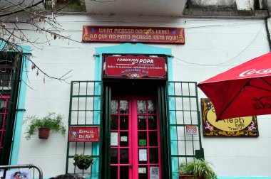 Shoping in Caminito Street, in La Boca. One of the most visited attractions in Buenos Aires, Argentina