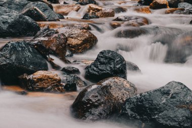 Long exposure of a river with wild water