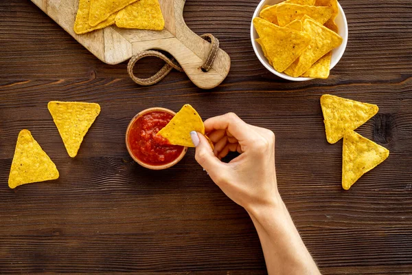 Mexican food nachos chips with tomato salsa sauce, top view — Stock Photo, Image