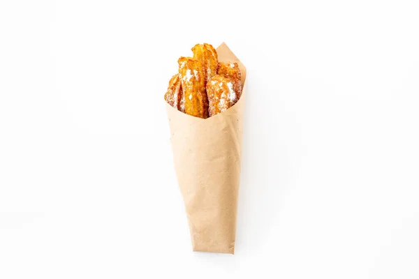 Churros street food dessert in paper bag — Stock Photo, Image