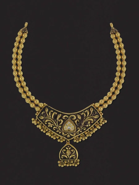 Indian style heavy gold Necklace on a base