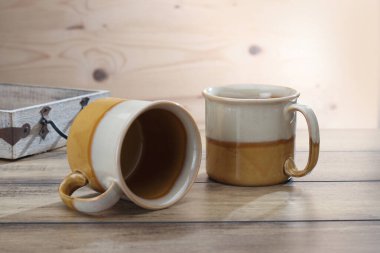 empty coffee mug in a creative composition