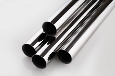 Stainless steel pipes on a white base.