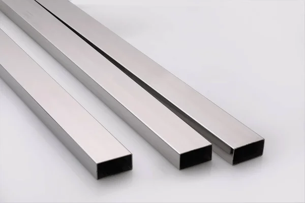Stainless Steel Pipes White Base lizenzfreie Stockbilder