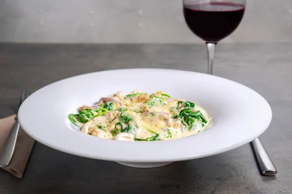 Italian Gnocchi With Roasted Chicken Breast And Spinach And Red Wine