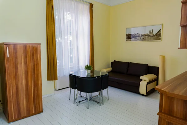 Comfortable Leather Sofa In the Dining Room, In an apartment. High quality photo