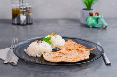 Grilled Chicken Breast with grill vegetables spice and steamed Rice. High quality photo