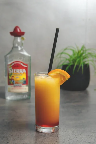 Orange and Red, Tequilla Sunrise cocktail in a Restaurant. High quality photo