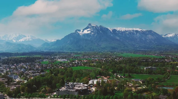 high mountains and village in the valley with clouds. High quality photo