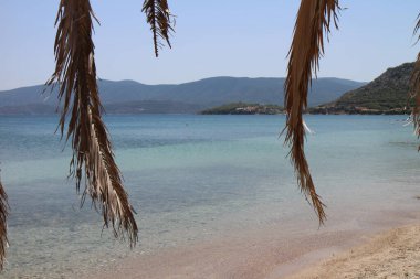 Crystal clear water on a beach in Greece