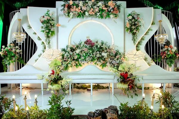 Wedding decorations. Wedding backdrop with flowers and Indonesian wedding decorations.