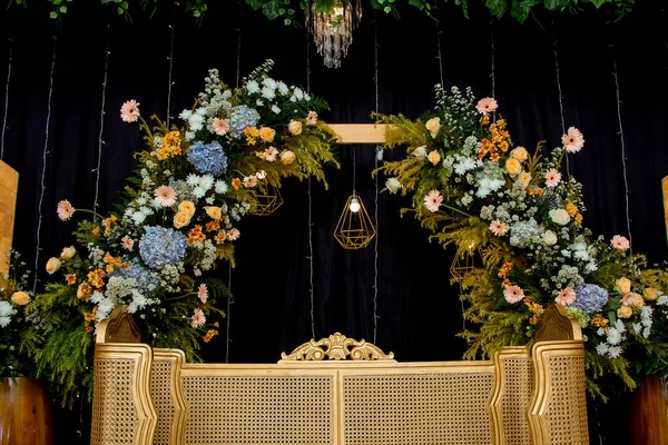 Wedding decorations. Wedding backdrop with flowers and Indonesian wedding decorations.