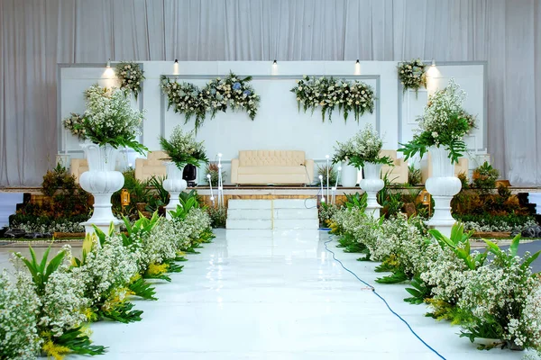 Wedding decorations. Wedding backdrop with flowers and Indonesian wedding decorations.