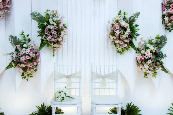 Wedding decorations. Wedding backdrop with flowers and Indonesian wedding decorations.