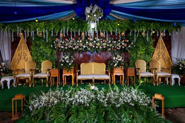 Wedding decorations. Wedding backdrop with flowers and Indonesian wedding decorations.