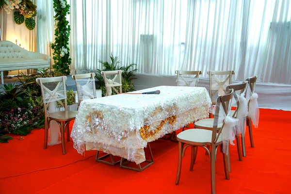Wedding decorations. Wedding backdrop with flowers and Indonesian wedding decorations.