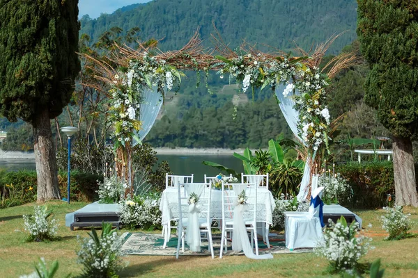 Wedding decorations. Wedding backdrop with flowers and Indonesian wedding decorations.