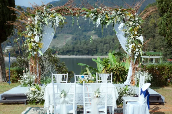 Wedding decorations. Wedding backdrop with flowers and Indonesian wedding decorations.