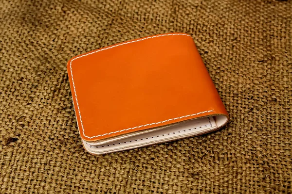 Men Brown Leather Wallet Touch Netted Background Texture Table — Fotografia de Stock