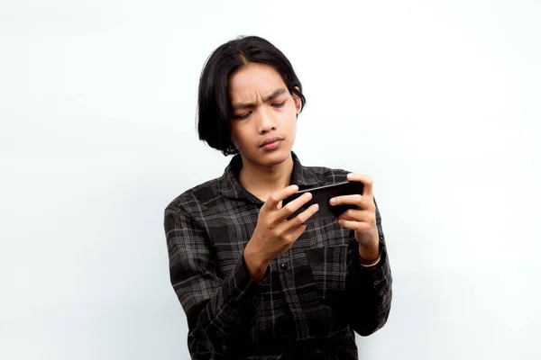 Portrait Asian Man Serious Expression Wearing Black Plaid Shirt Using — Stock Photo, Image