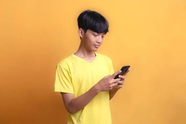 Portrait Asian Young Man Wearing Yellow Shirt Looking Happy Seeing — Stok fotoğraf