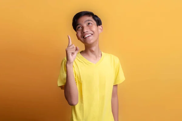 Portrait Asian Young Man Wearing Yellow Shirt Looking Happy Seeing — Foto Stock