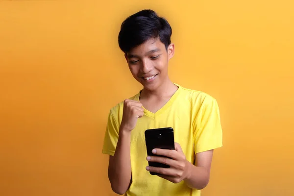 Portrait Asian Young Man Wearing Yellow Shirt Communicate Using Smart — Stok Foto