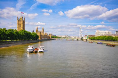 River Thames London with a view of the Houses of parliament, Big Ben and the London Eye