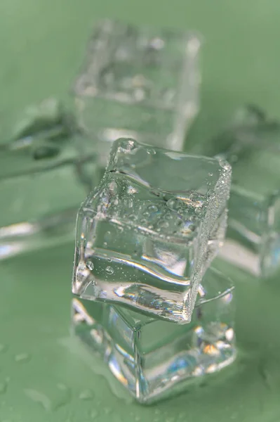 Multiple Frozen Ice Cubes Green Background — Stock Photo, Image