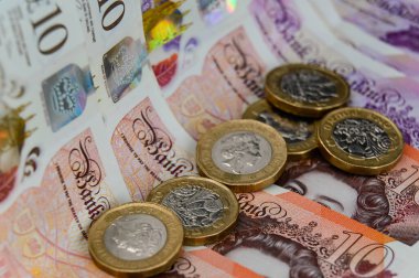 GBP İngiliz 1 pound bozukluk ve 10 pound 'luk banknot.